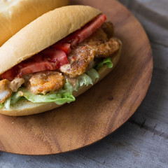 Top view of a po boy, made with shrimp. 