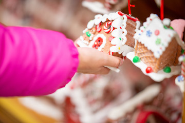 Young girl hand touching Christmas Balls