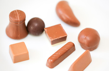 Yummy chocolate candies on white background - Image