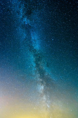 Fototapeta premium Milky Way over a forest at night