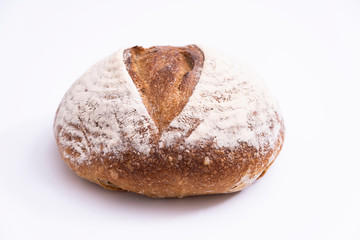 Freshly baked bread isolated on white background. Sour leavened bread.