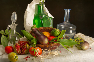Still life of various vegetables, old bottles and fruits