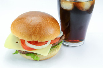 burger with beef and glass of cola on a white background