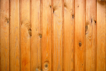 Naklejka premium Background of wooden boards painted with stain in yellow.