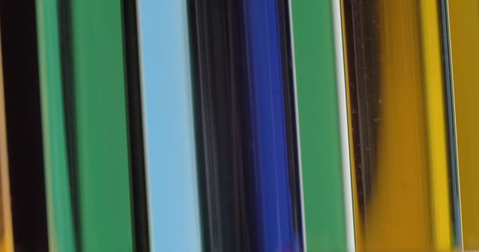 Close up test tubes in laboratory with different color liquid inside. Science concept. Toxic chemistry liquid. 4k.