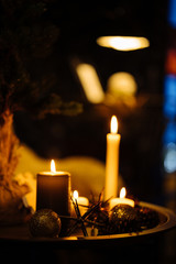 New Year 2020 interior with candles, bulbs and bokeh
