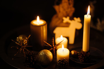 New Year 2020 interior with candles, bulbs and bokeh