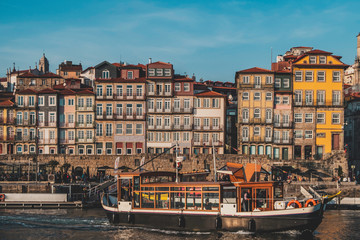 Naklejka premium Colorful houses of Ribeira, in front of the Douro river in Porto, Portugal