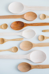 Assortment of wooden spoons.Set of new wooden kitchen utensils (spoons) isolated on white.