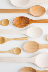 Assortment of wooden spoons.Set of new wooden kitchen utensils (spoons) isolated on white.
