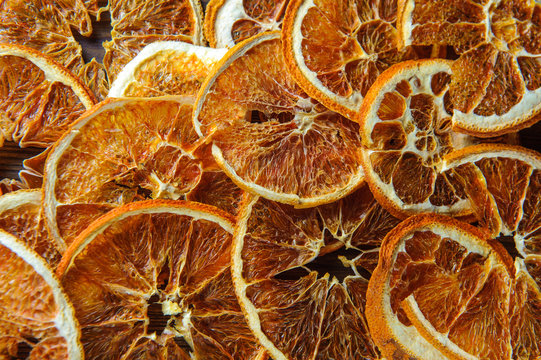 dried orange on a wooden table in the kitchen