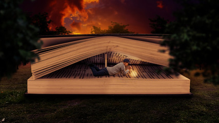 Man reading inside a huge book