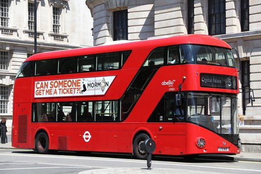 LONDON, UK - JULY 6, 2016: New Routemaster bus in London. The hybrid diesel-electric bus is a new, modern version of iconic double decker.