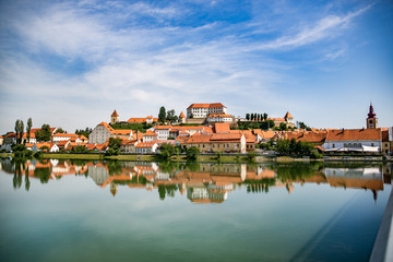 Fototapeta na wymiar Ptuj town in Slovenia - beautiful view over the old town and castle in the sunny day