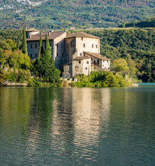 Fototapeta na wymiar Lake and Castel Toblino, idyllic location in the Province of Trento, Trentino Alto Adige, northern Italy.