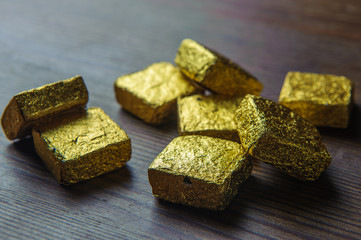 Chinese tea in gold packaging on a wooden table1
