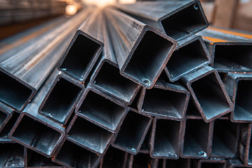Steel bar for construction.Metal pipe profile. Stock photo of metal beams.
