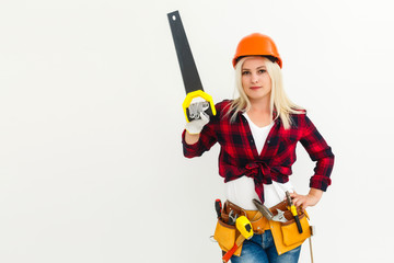 working woman in helmet with a saw isolated on white background. Female in male work. Renovation concept
