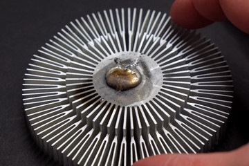 Liquid metal on aluminum processor cooling radiator