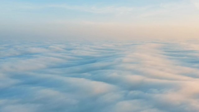 flying over the clouds