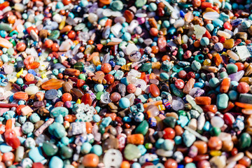 Mass of colored polished stones.