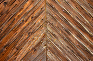 Fototapeta premium Wooden background, vintage rotten planks that survived on an old 18th century barn, Ohio USA