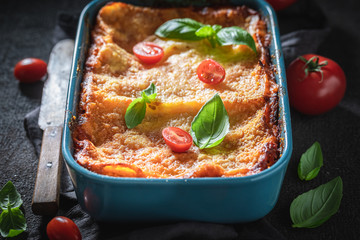 Delicious lasagna baked in casserole with cheese