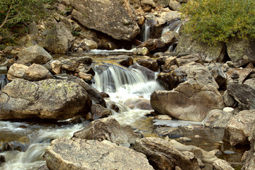 Waterfalls snaking their way thru the rocky mountain stream bed