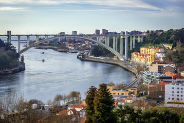 Arrabida Bridge connected Porto and Vila Nova de Gaia. View from Crystal Palace Park