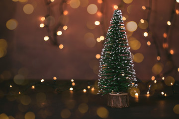 Christmas tree surrounded by bokeh lights