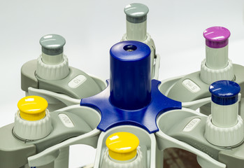 pipette stand with different pipettes - laboratory
