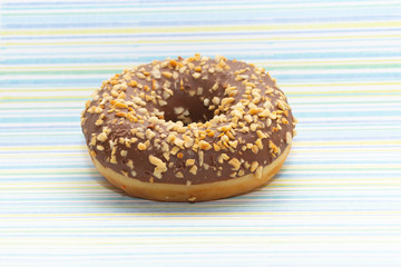 donut on blue with lines background, close up view