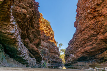 in the Australian outback there is a rugged rock formation called Simpsons Gab