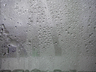 Frozen glass. Water drops