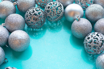 Christmas baubles decoration on blue background.