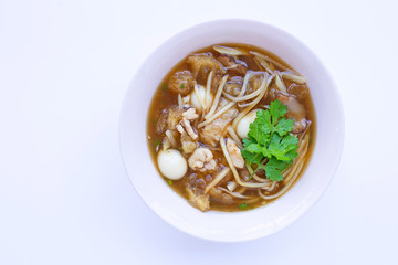 Braised fish maw in red gravy in bowl on white