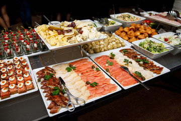 Different types of fish on the banquet table.