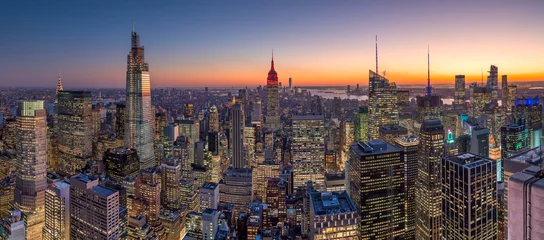 Deurstickers Manhattan New York City Manhattan gebouwen skyline zonsondergang avond