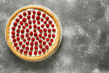 Tasty berry pie on grey background