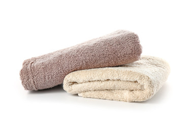 Fototapeta na wymiar Soft clean towels on white background