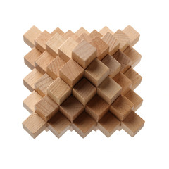 Wooden puzzle over white background