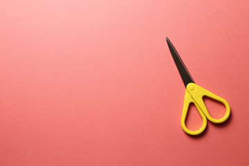 Scissors isolated on pink background