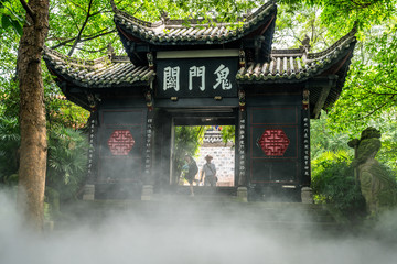 Gates of Hell aka Guimen gate and mist in Fengdu Ghost city Fengdu Chongqing China translation : Gate to Hell - Powered by Adobe