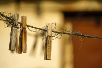 Wooden latches on the tortured nylon rope close up view