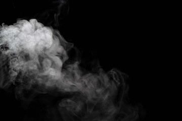 Abstract powder or smoke isolated on black background.