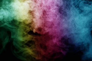 Obraz na płótnie Canvas Abstract smoke isolated on black background,Rainbow powder