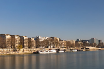 Fototapeta na wymiar 27 FEB 2019, Paris, France - Seine river bank between Ile de la Cite and Gare de Lyon