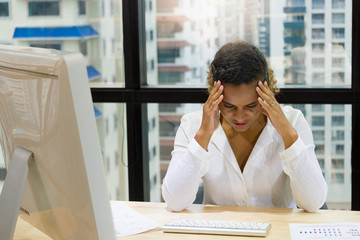 Woman stress from work.