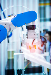 robot arm is working smartly in the production department in artificial intelligence factory