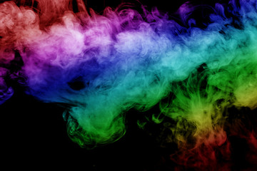 Abstract smoke isolated on black background,Rainbow powder
